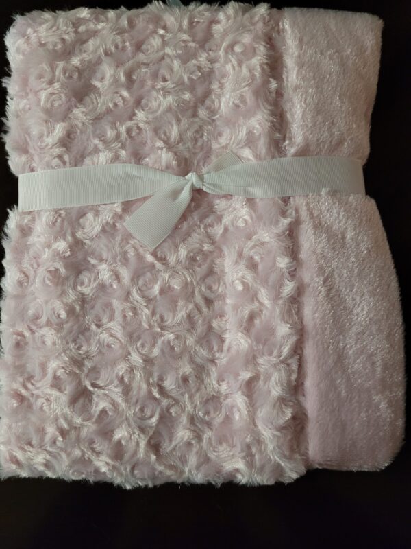 A pink baby blanket.