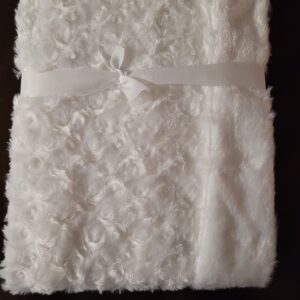A white baby blanket.